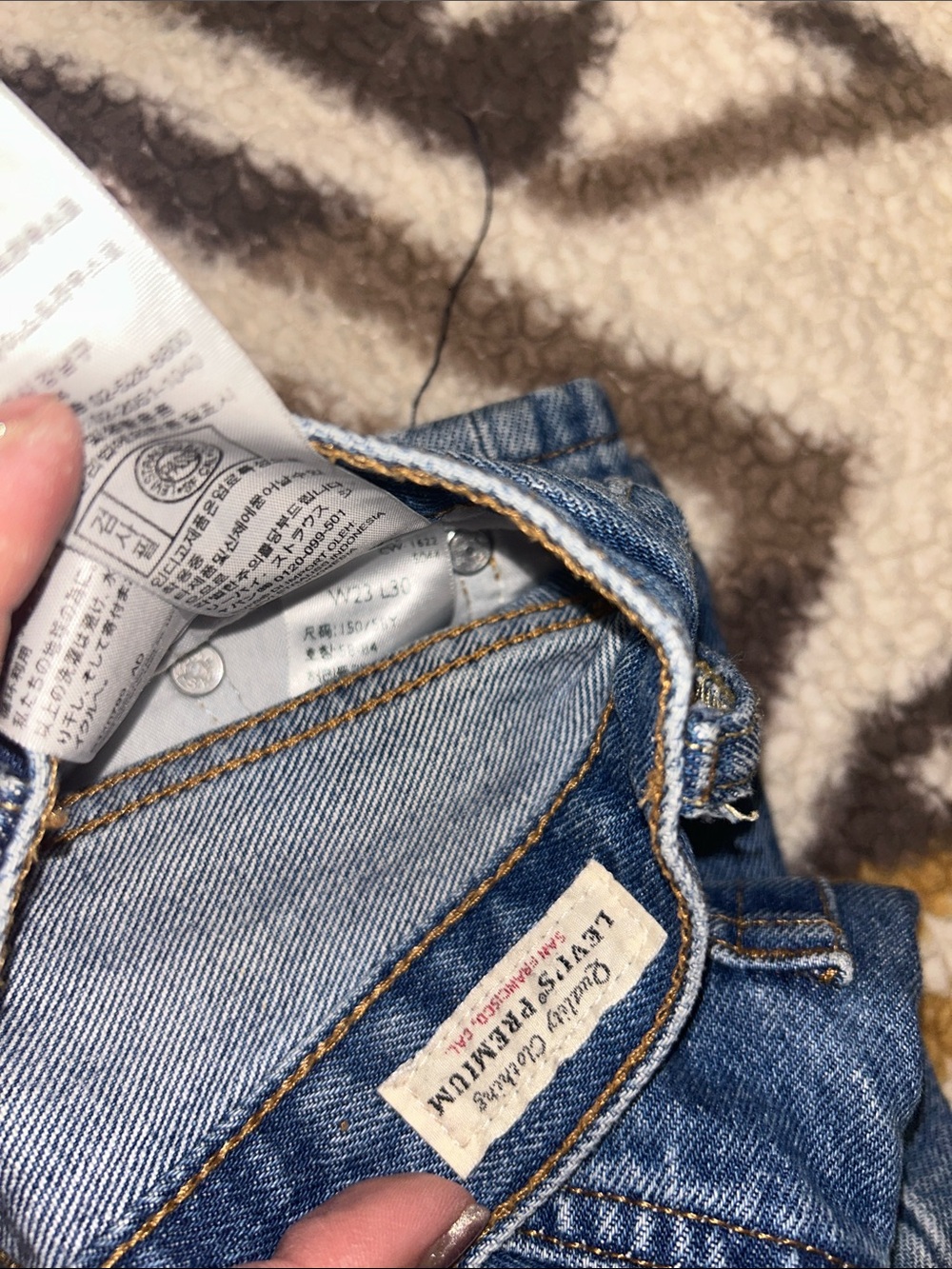 Levi's Light Blue Denim Jeans with Gold Stitching